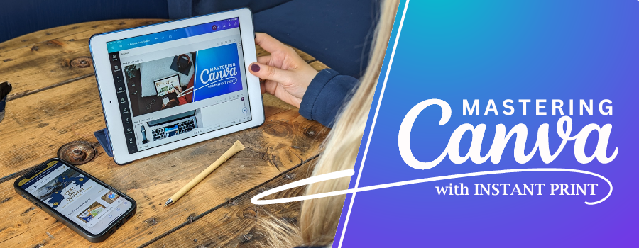 Person on Ipad looking at Mastering Canva with Instant Print