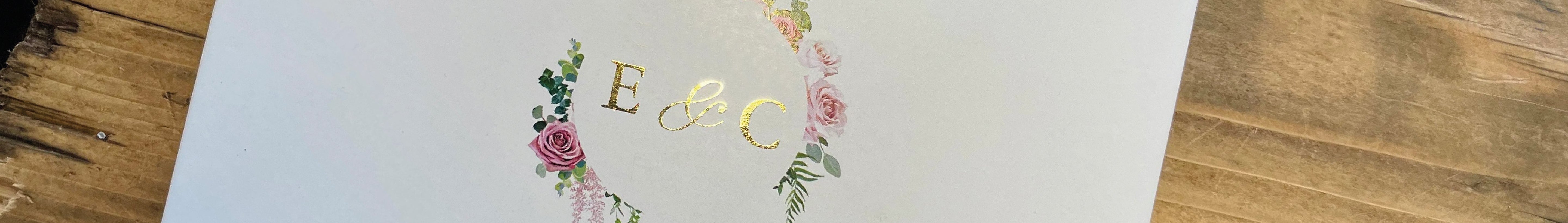 Gold Foil Wedding Invitation on Wooden Table