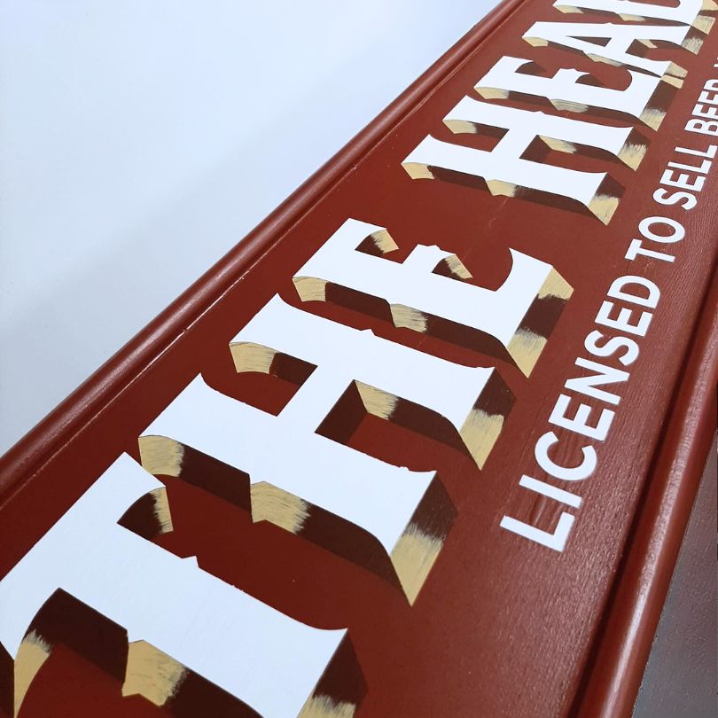 close up of Shop Signage for Head O' The Road