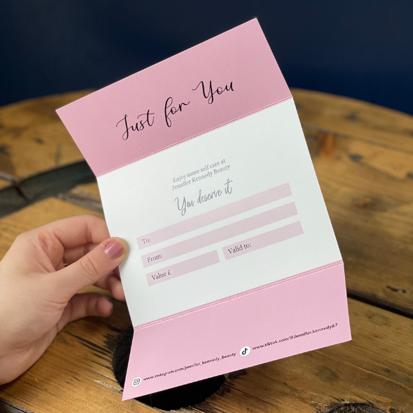 Pink and white Gate fold gift voucher for JK Beauty