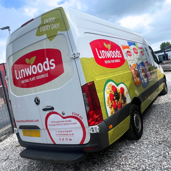 Green and red vehicle wrap on a van for Linwoods