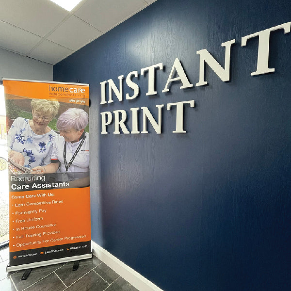 Pop Up Banner for HomeCare in the office of Instant Print Armagh.