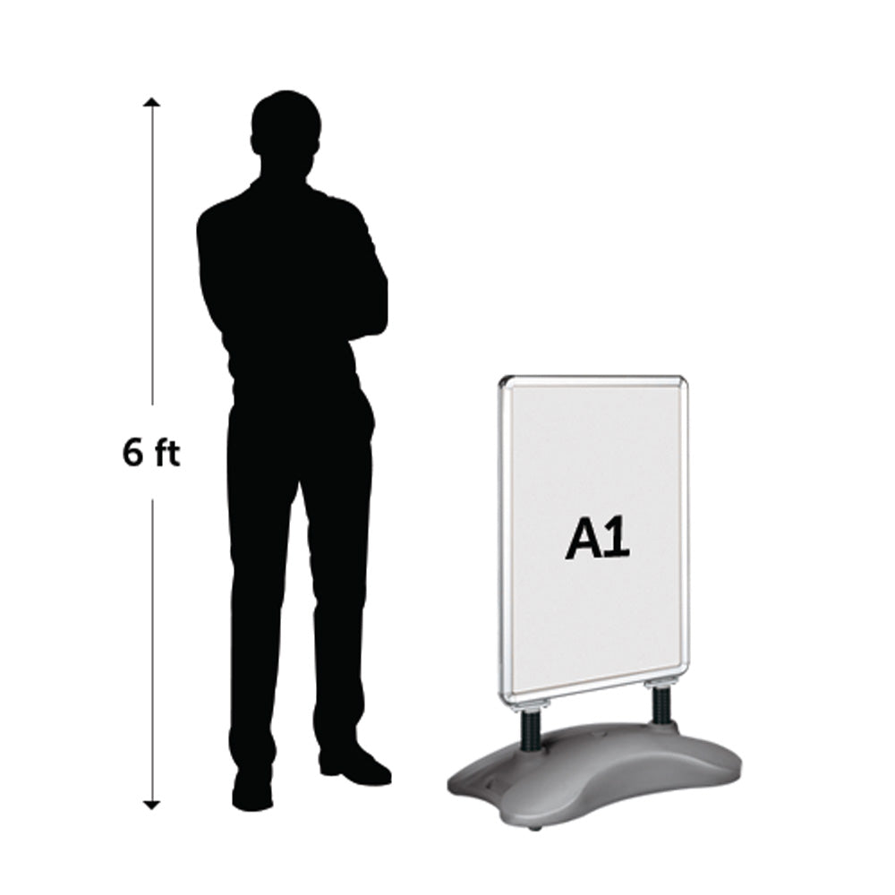 Depicting the side of a waterbase pavement sign, compared to a 6ft person.
