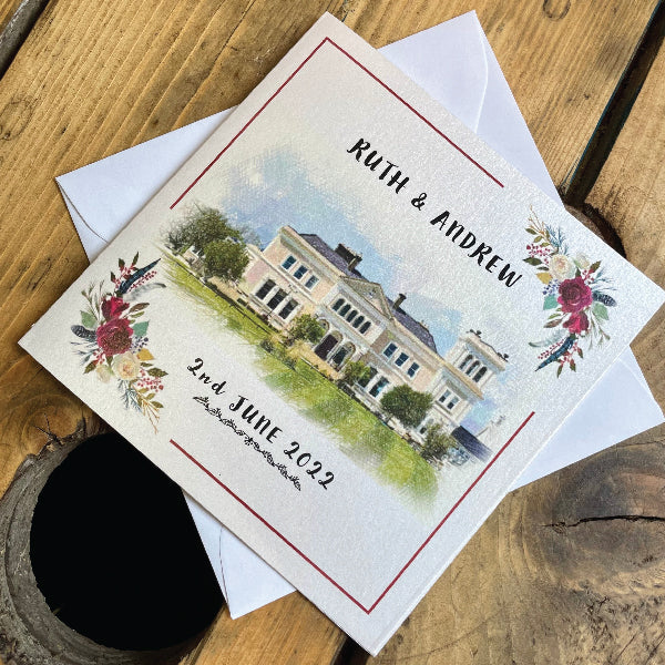 Folded Square Wedding Invitation, printed on Ivory Pearlescent Card, with a floral design and the wedding venue