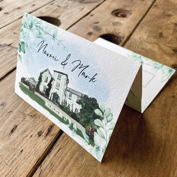 Z-folded Wedding Invitation, printed on Textured Card, with a floral design of a watercoloured wedding venue design