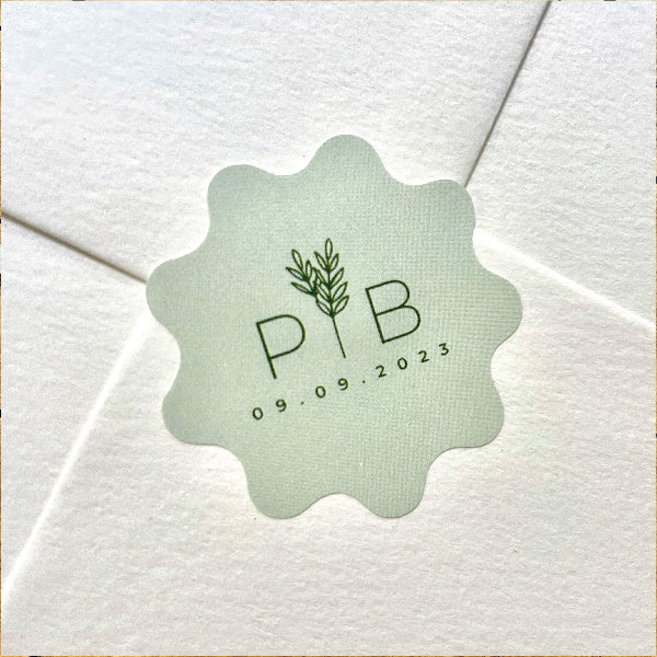 Light Green Custom Shape Wedding Stickers, with the initials PB, on the back of a Textured Envelop
