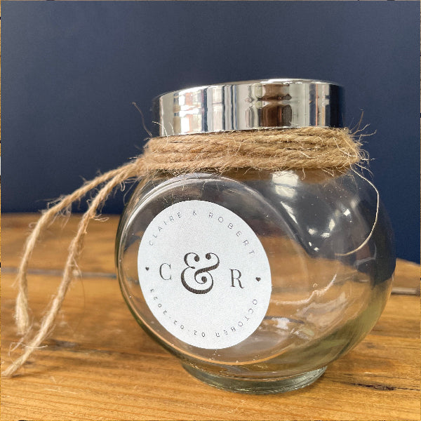 Light Blue Circular Wedding Sticker on a glass jar, for a Wedding Favour.