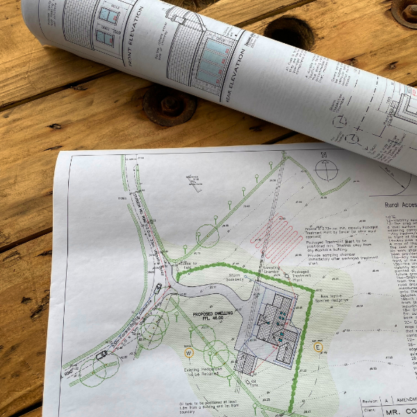 plan prints on wooden table