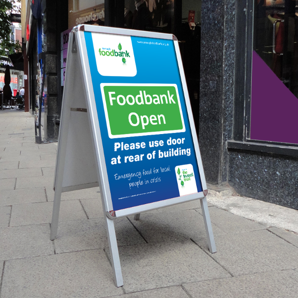Outside Display Board - A-Master Board, with a poster for the FoodBank