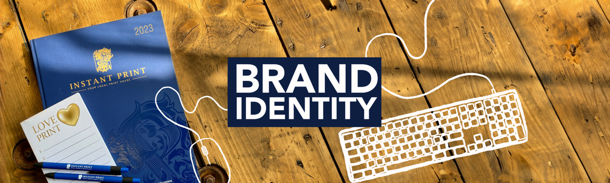 Brand Identity with artwork on image of diary on a wooden table