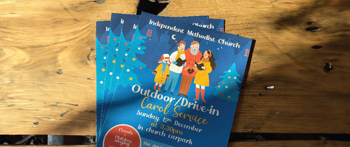 Blue Christmas Leaflet A5 on Wooden Table