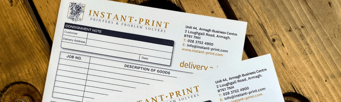 Invoice books on wooden table