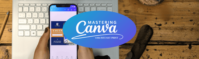 Person on Ipad looking at Mastering Canva with Instant Print