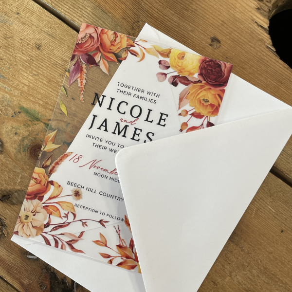 Floral acrylic wedding invitation with white envelope
