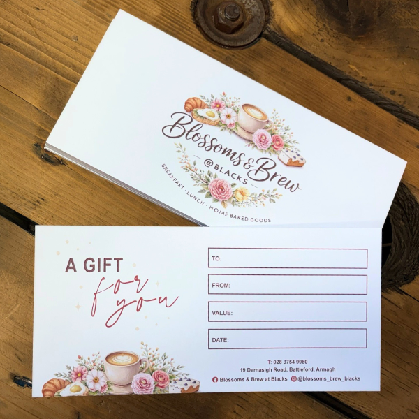 gift vouchers on wooden table