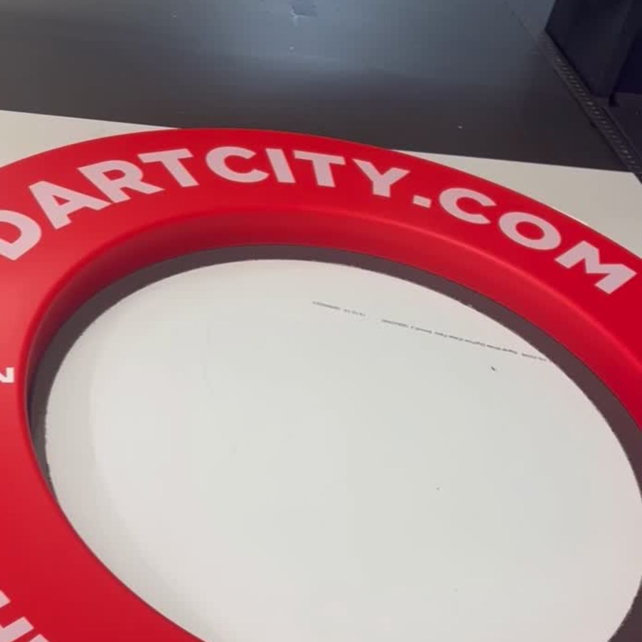 Red custom Dart Surround with 'DARTCITY.COM' text on a white background