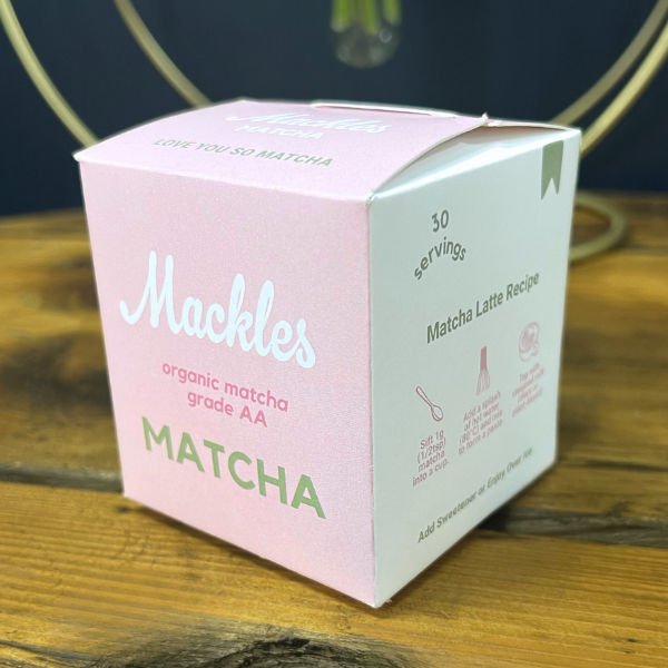 Mackles Matcha pink and white box on wooden table