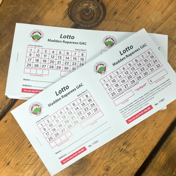 Madden Raparees GAC lottery tickets on a wooden surface