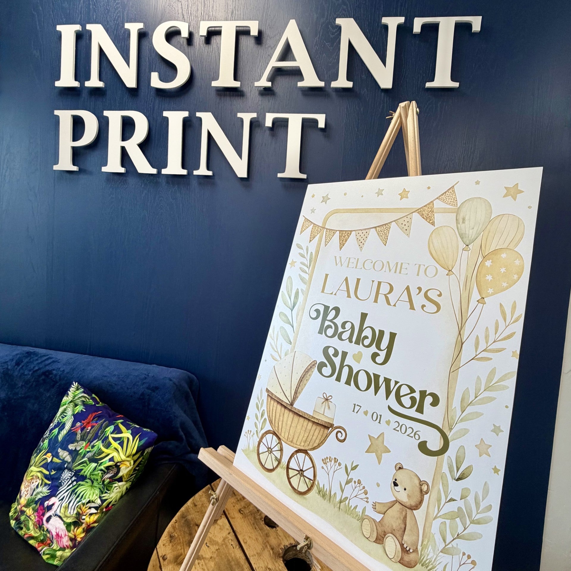 Foamex Board for a Baby shower, pictured infront of the Instant Print Signage.