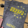 Europa Dundalk Black and yellow menu opening on wooden table